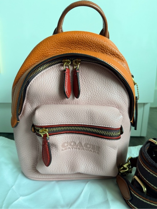 Coach Pink Pebbled Leather Mini Backpack with Saddle Brown Trim
